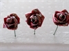3 stk. Voksede røde skum roser på tråd. Ø ca. 4 cm. Velegnet i dekorationer . Med glimmer.